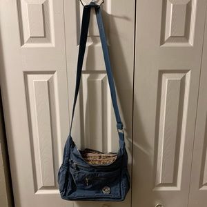 Sturdy travel crossbody blue purse in great cond